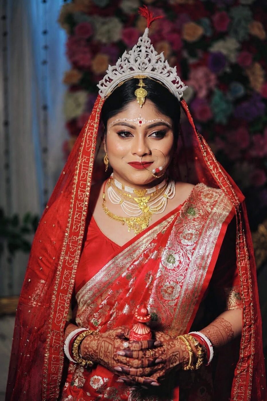 Bridal makeup holding kalash