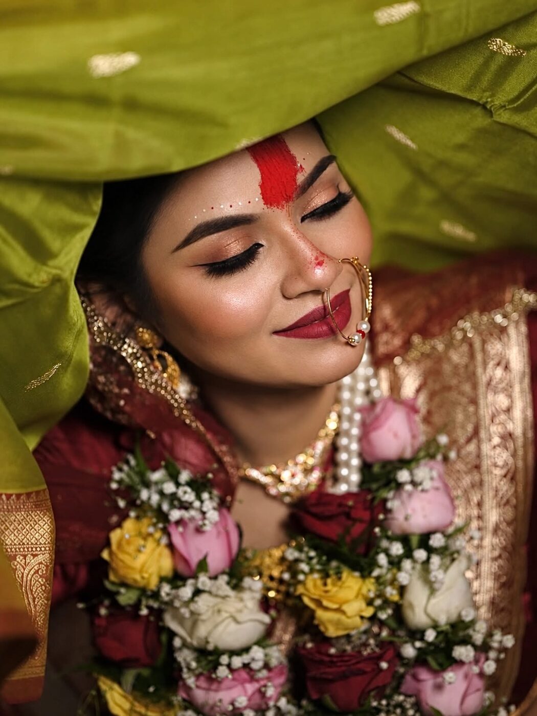 Engagement look under floral veil